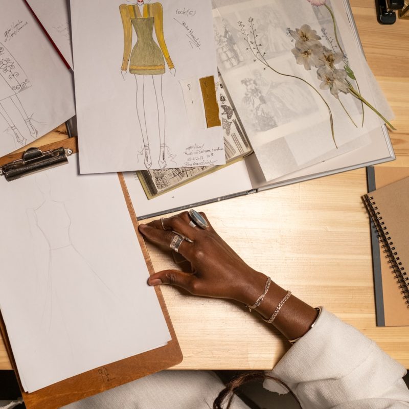 Fashion Designer Sketching Design